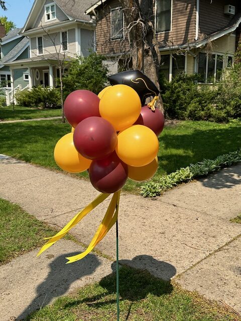 Balloon Star on stake with grad cap addition