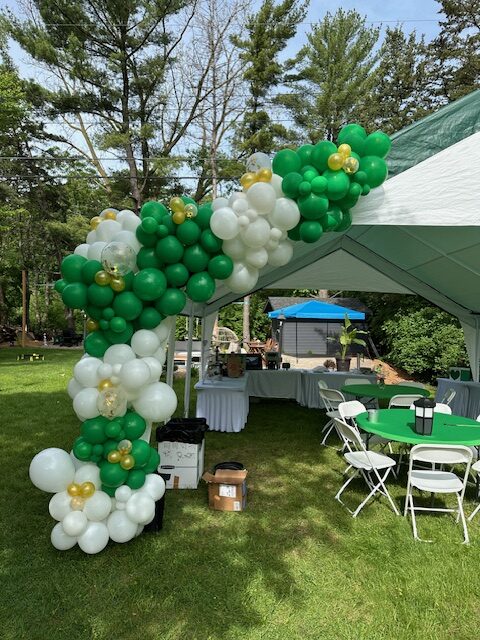 Green and White Garland on a Tent